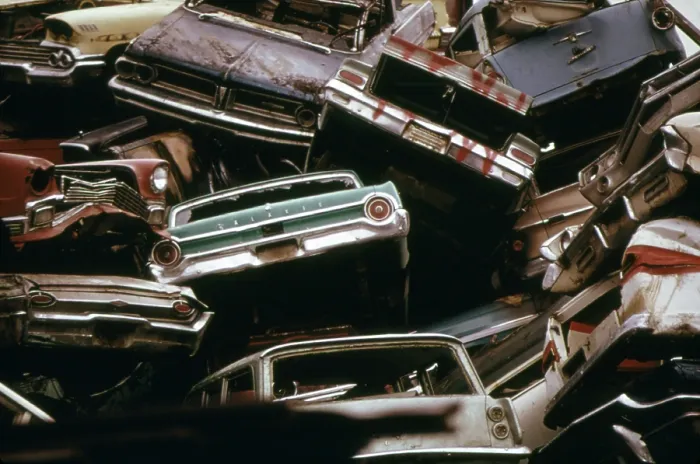 Framed Print : American cars crushed for scrap steel to be recycled in Japanese steel mills and used in the manufacture of Toyotas and Datsun exported back to the US. Ca. 1973-75 Framed Print : American cars crushed for scrap steel to be recycled in Japanese steel mills and used in the manufacture of Toyotas and Datsun exported back to the US. Ca. 1973-75