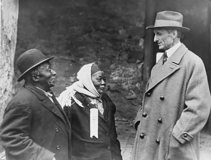 Framed Print : American Democratic politician, William Gibbs McAdoo (1863-1941), greeted by his family's African American servants, Uncle Jim and Mammy Julia at his birthplace near Marietta