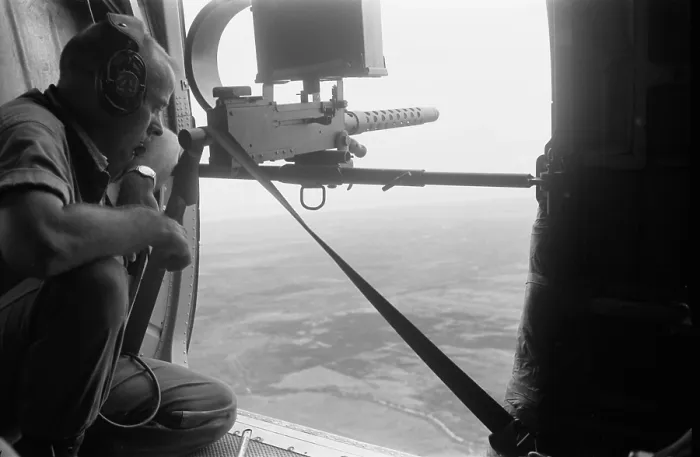 Framed Print : American door gunner scans the Vietnamese landscape from a helicopter. Mar. 25, 1962. Photo by Robert Pepper Martin. (BSLOC_2015_14_135) Framed Print : American door gunner scans the Vietnamese landscape from a helicopter. Mar. 25, 1962. Photo by Robert Pepper Martin. (BSLOC_2015_14_135)