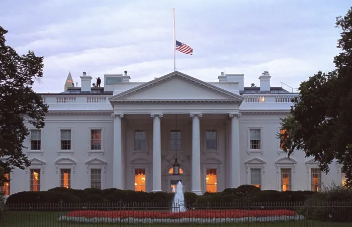 Framed Print : American flag flies at half-staff over the White House at sunrise Friday, Sept. 14, 2001