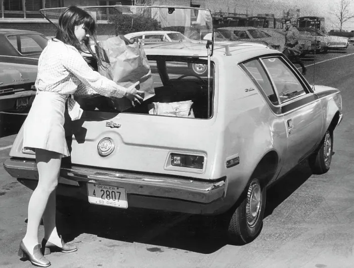 Framed Print : American Motors The Gremlin, car owner placing grocery bags inside the rear lift-gate, April 9, 1970. Courtesy: CSU Archives / Everett Collection