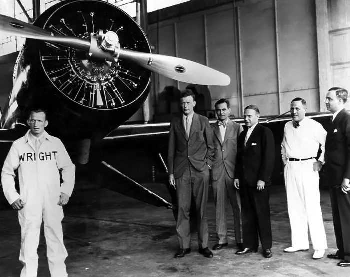 Framed Print : American pilot Charles Lindbergh, prepares for a flight to Greenland. L-R: F. Vernon Ash, Engineer of Wright Aeronautical Corp. Charles Lindbergh, P.B