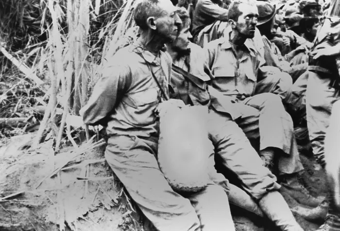 Framed Print : American POWs along the Bataan Death March to a prison camp at Cabanatuan. These prisoners have their hands tied behind their backs. World War 2, May 1942. (BSLOC_2013_11_206)