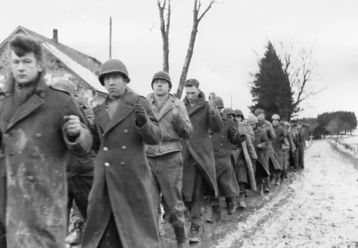 Framed Print : American prisoners of war are marched along a road during the Battle of the Bulge. Still from a captured German film. Ca. Dec. 10-17, 1944. World War 2. (BSLOC_2014_10_92) Framed Print : American prisoners of war are marched along a road during the Battle of the Bulge. Still from a captured German film. Ca. Dec. 10-17, 1944. World War 2. (BSLOC_2014_10_92)