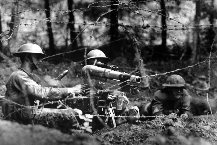 Framed Print : American soldiers firing a French 37 mm artillery gun in second-line trench