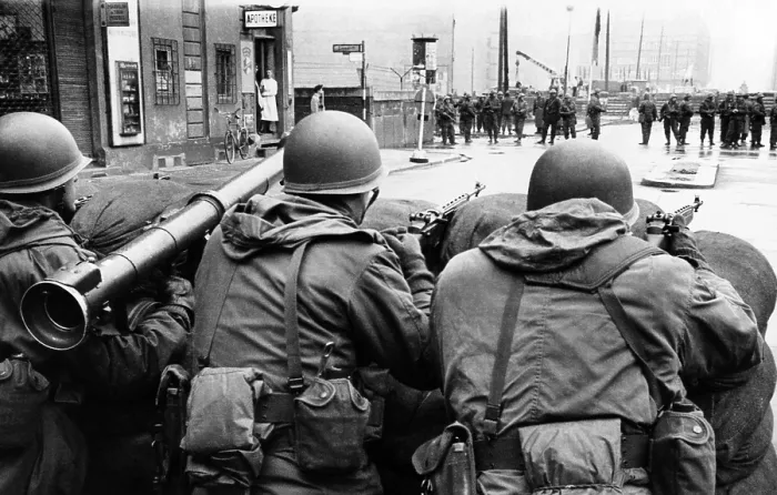 Framed Print : American troops face East Berlin behind sandbags at Checkpoint Charlie at Friedrichstrasse in West Berlin. In the distance are East German soldiers. Dec. 4, 1961 Framed Print : American troops face East Berlin behind sandbags at Checkpoint Charlie at Friedrichstrasse in West Berlin. In the distance are East German soldiers. Dec. 4, 1961