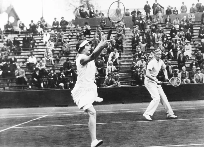 Framed Print : Americans Helen Wills Moody and Sidney Wood, in mixed doubles play in France. May 31, 1932
