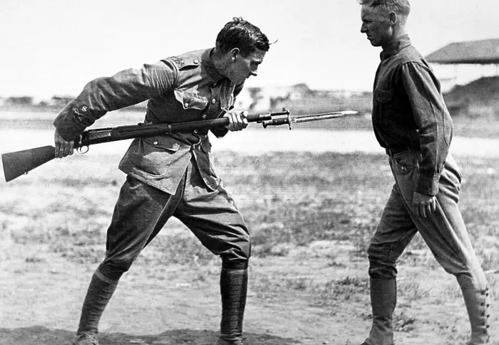 Framed Print : Americans receiving bayonet fighting instruction by an English Sgt. Major. At the beginning of World War I, the under staffed U.S. Army welcomed experienced British trainers