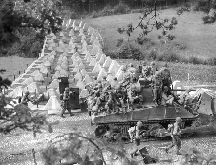 Framed Print : Americans roll through Siegfried Line on a tank dozer near Roetgen, Germany, on Sept. 28, 1944