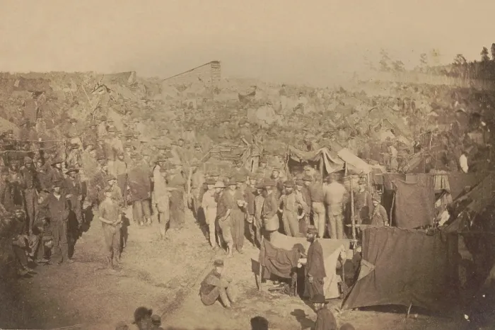 Framed Print : Andersonville Prison, Georgia, was photographed by A. J. Riddle, on August 17, 1864. The prisoners are crowded around the ration wagon in the center of the picture