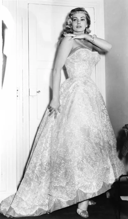 Framed Print : Anita Ekberg in a Pierre Balmain evening gown with diamond tiara, earings and bracelet by Van Cleef & Arpels, 1957