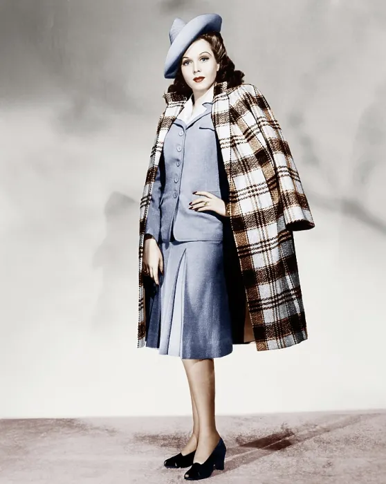 Framed Print : Ann Miller wearing light blue skirt suit and plaid overcoat, 1941 Framed Print : Ann Miller wearing light blue skirt suit and plaid overcoat, 1941