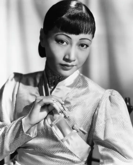 Framed Print : Anna May Wong, in an orange Nanking brocade robe with sandalwood fastenings, 1937
