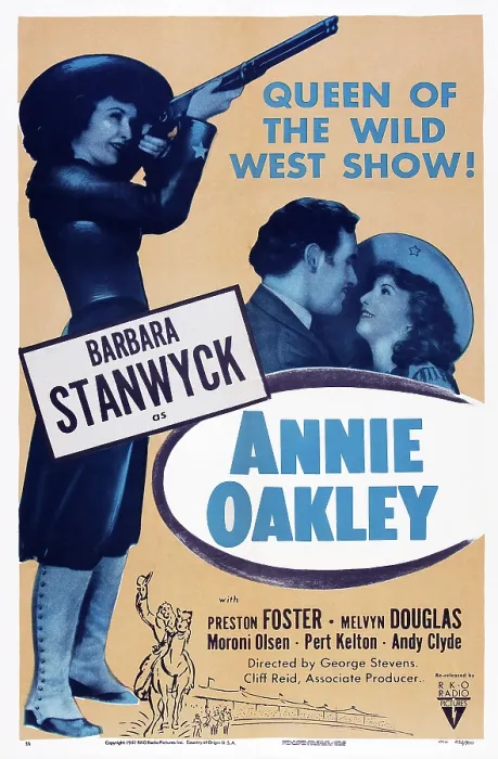 Framed Print : ANNIE OAKLEY, poster art, left and right: Barbara Stanwyck, center: Preston Foster, 1935 Framed Print : ANNIE OAKLEY, poster art, left and right: Barbara Stanwyck, center: Preston Foster, 1935