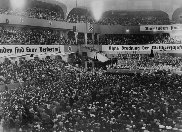 Framed Print : Anti-Semitic rally, with swastikas and anti-Semitic banners, at the massive auditorium of Sportpalast, Berlin, where Nazi propagandist, Julius Streicher, would speak on August 16