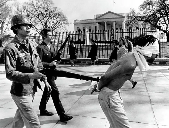 Framed Print : Anti-Vietnam War Protestors calling themselves Spring Mobilization for Peace, demonstrating with toy rifles in front of the White House, Washington D.C. 04-08-67