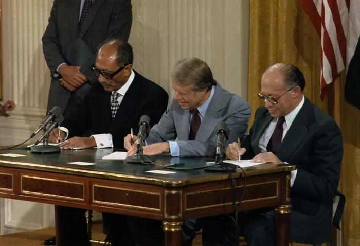 Framed Print : Anwar Sadat Jimmy Carter and Menahem Begin at the Camp David Accords signing ceremony which lead to a Peace treaty between Egypt and Israel. Sept. 17 1978