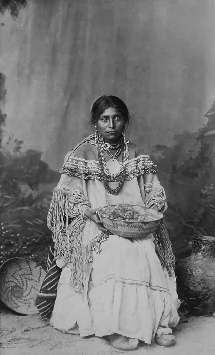 Framed Print : An Apache bride wears a costume that combines Mexican influence on Apache clothing in the 19th century