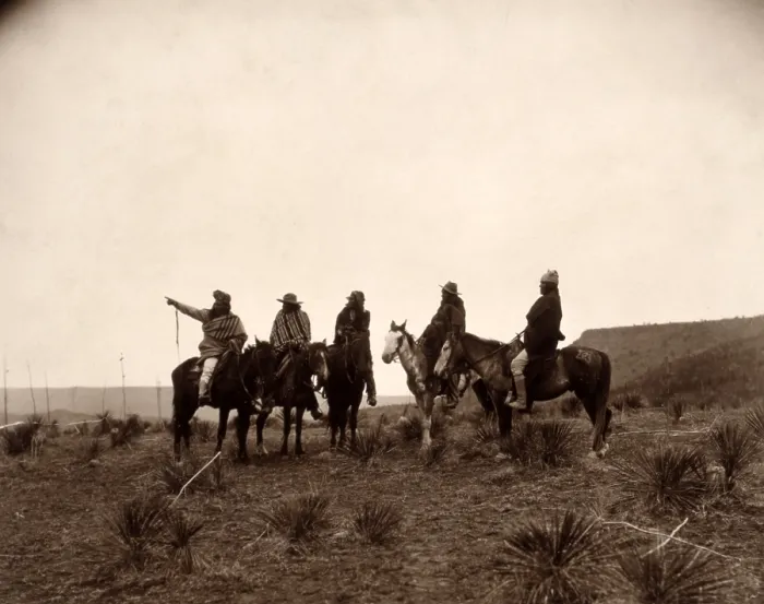 Framed Print : Apaches. The lost trail- Five Apache on horseback in the desert. photo by Edward S. Curtis, 1903
