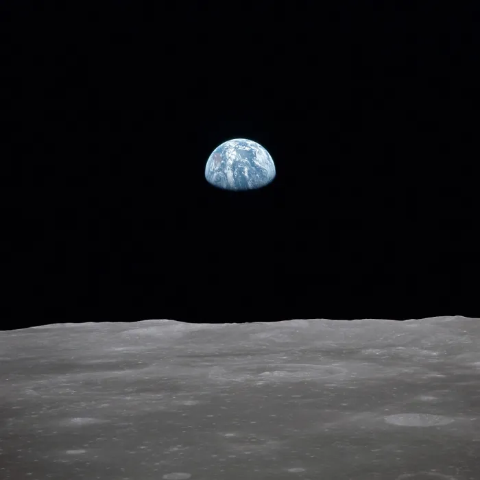 Framed Print : Apollo 11 Earth rise over the Moon. Earth on the horizon in the Mare Smythii Region of the Moon. Image 17 of a NASA sequence of 18. July 20, 1969