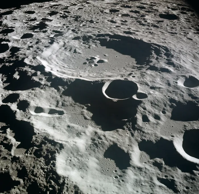 Framed Print : Apollo 11 Moon view. Crater Daedalus on the lunar, has a diameter of about 50 miles and is a typical of the rugged terrain on the far side of the Moon Framed Print : Apollo 11 Moon view. Crater Daedalus on the lunar, has a diameter of about 50 miles and is a typical of the rugged terrain on the far side of the Moon