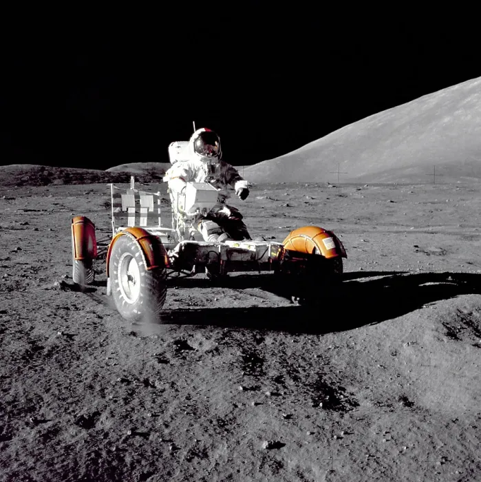 Framed Print : Apollo 17 Astronaut Eugene A. Cernan driving the Lunar Rover. The mountain in the background is the east end of South Massif. Nov. 11-14, 1972 Framed Print : Apollo 17 Astronaut Eugene A. Cernan driving the Lunar Rover. The mountain in the background is the east end of South Massif. Nov. 11-14, 1972
