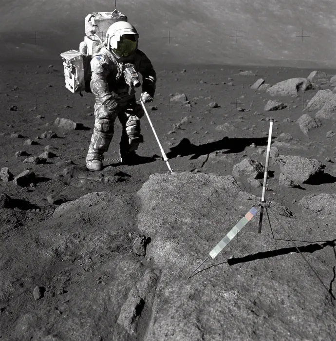 Framed Print : Apollo 17 Geologist-Astronaut Harrison Schmitt covered with lunar dirt. Schmitt scoops up lunar samples