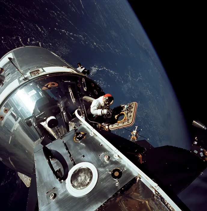 Framed Print : Apollo 9 astronaut Dave Scott stands in the open hatch of the Command Module, docked to the Lunar Module in Earth orbit Framed Print : Apollo 9 astronaut Dave Scott stands in the open hatch of the Command Module, docked to the Lunar Module in Earth orbit
