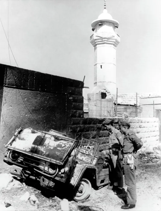 Framed Print : Arab-Israeli War, Royalist soldiers inspecting the burned hulk of a Commando vehichle outside guerrilla headquarters, Amman, Jordan, 09 / 26 / 70 Framed Print : Arab-Israeli War, Royalist soldiers inspecting the burned hulk of a Commando vehichle outside guerrilla headquarters, Amman, Jordan, 09 / 26 / 70