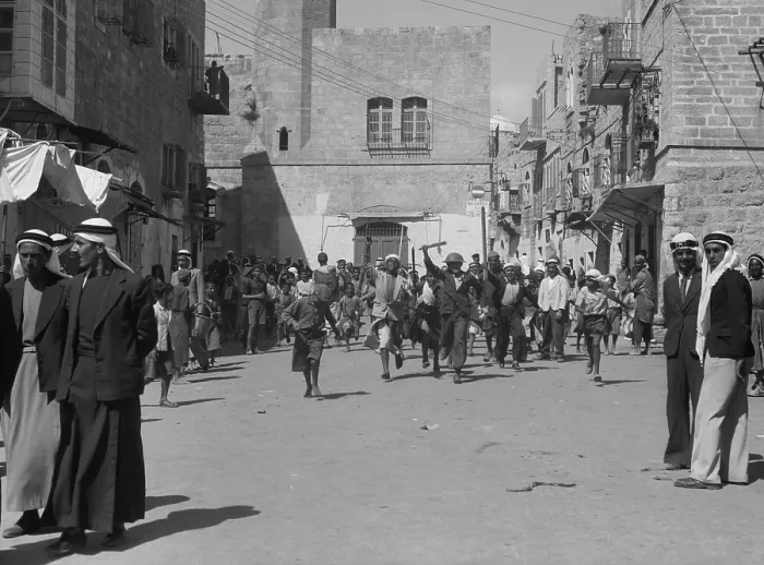 Framed Print : Arab youths running in Bethlehem after burning government offices during Arab Revolt. Sept. 14, 1938 (BSLOC_2017_1_206) Framed Print : Arab youths running in Bethlehem after burning government offices during Arab Revolt. Sept. 14, 1938 (BSLOC_2017_1_206)