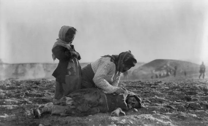 Framed Print : Armenian mother kneeling beside her dead child near Aleppo. 1915-20. Many deportees died when forced to cross the Syrian desert of Deir ez-Zor in the Euphrates Valley