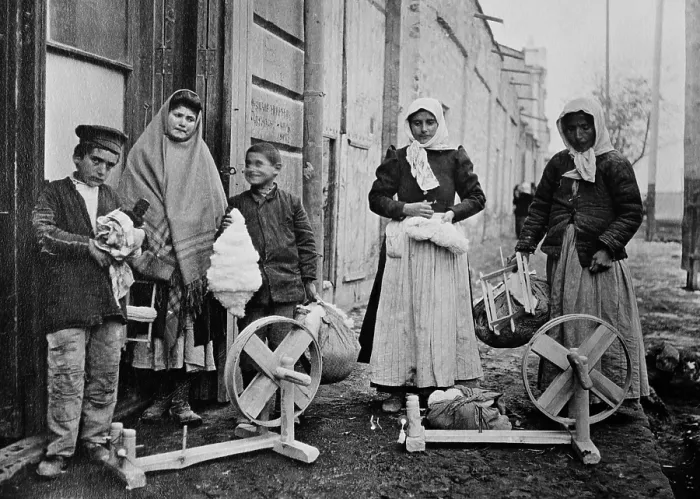Framed Print : Armenian women and boys with spinning wheels and cotton. Ca. 1915-21. This is possibly a refugee family receiving tools to make a living in Yerevan, Armenia. (BSLOC_2013_5_31) Framed Print : Armenian women and boys with spinning wheels and cotton. Ca. 1915-21. This is possibly a refugee family receiving tools to make a living in Yerevan, Armenia. (BSLOC_2013_5_31)