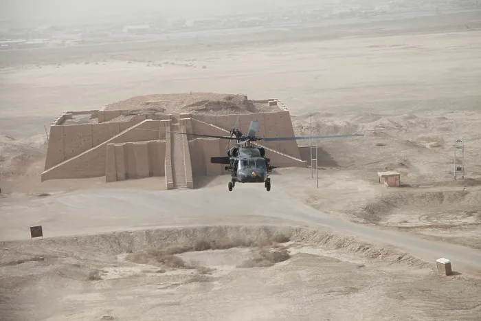Framed Print : A US Army Black Hawk helicopter hovers above the ancient Ziggurat of Ur near Nasiriyah Iraq Oct. 11 2009. Aerial view shows the upper steps of the ancient Neo-Babylonian monument