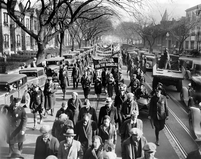Framed Print : Part of the army of Hunger Marchers walk down Pennsylvania Avenue on Dec. 6, 1931. Police had allowed them the march into the city of Washington, DC