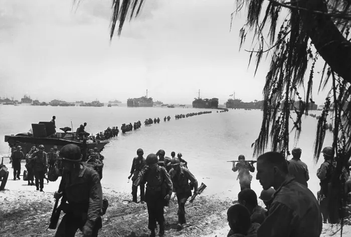 Framed Print : Army reinforcements wade ashore on Saipan without enemy opposition. They will relieve Marines in the battle of attrition raging in the island's interior