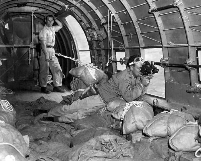 Framed Print : Army Signal Corps photographer, shoots motion pictures of a supply drop to Chinese Forces. World War 2, June 17, 1944. (BSLOC_2013_14_90)
