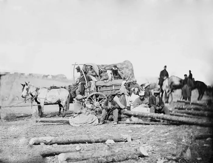 Framed Print : Arrival of an African American family in a Union army camp in January 1863, in a horse drawn covered wagon. Photo by David B Framed Print : Arrival of an African American family in a Union army camp in January 1863, in a horse drawn covered wagon. Photo by David B