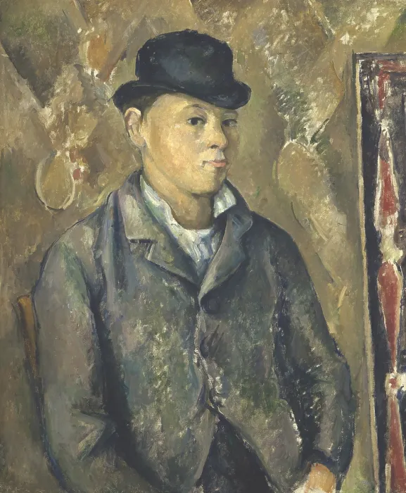 Framed Print : The Artist's Son, Paul, by Paul Cezanne, 1885-90, French Post-Impressionist painting, oil on canvas. The forms in the painting background are not painted as cohesive objects