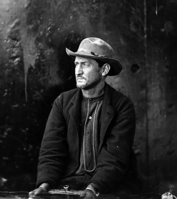 Framed Print : Assassins. Edman Spangler, a 'conspirator, ' in hat and manacled. Photograph by Alexander Gardner, April 1865