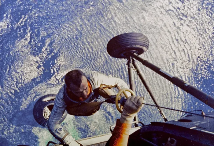 Framed Print : Astronaut Alan B. Shepard is hoisted aboard a U.S. Marine helicopter after splashdown of his Freedom 7 Mercury space capsule