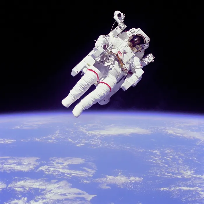 Framed Print : Astronaut Bruce McCandless in floating weightless 320 feet from the space shuttle Challenger. He tested a nitrogen jet propelled backpack to maneuver in zero gravity. Feb Framed Print : Astronaut Bruce McCandless in floating weightless 320 feet from the space shuttle Challenger. He tested a nitrogen jet propelled backpack to maneuver in zero gravity. Feb