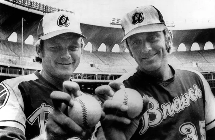 Framed Print : Atlanta Braves pitchers Joe Niekro, Phil Niekro demonstrate their knuckleball grips before a game in St. Louis, 1973. Courtesy: CSU Archives  /  Everett Collection