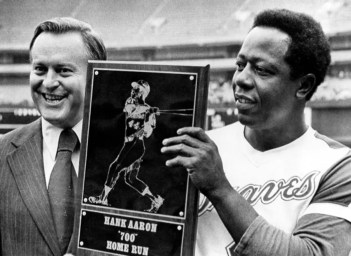 Framed Print : Atlanta Braves president William Bartholomay presents Hank Aaron with the plaque honoring his 700th home run, 1973. Courtesy: CSU Archives  /  Everett Collection