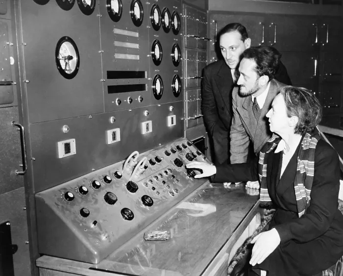 Framed Print : Atomic scientist Irene Curie (1897 -1956), operating the controls of France's first nuclear reactor at Chatillon, a Parisian suburb in 1948