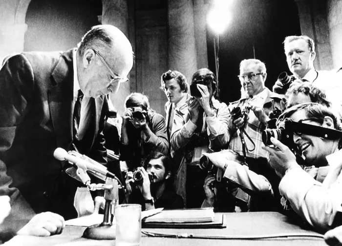 Framed Print : Former Atty. Gen. John Mitchell surrounded by photographers at Watergate hearings. July 10, 1973