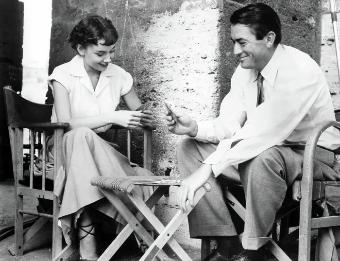 Framed Print : AUDREY HEPBURN and GREGORY PECK play cards while on location for ROMAN HOLIDAY, 1953 Framed Print : AUDREY HEPBURN and GREGORY PECK play cards while on location for ROMAN HOLIDAY, 1953