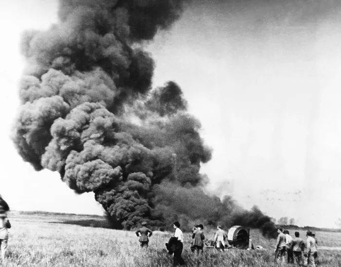 Framed Print : Auguste Piccard's balloon disappearing in smoke and flame, May 31, 1937. In the foreground is the basket