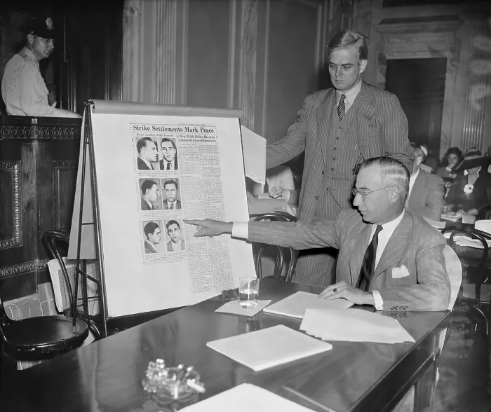 Framed Print : Auto industry lobbyist attacks the Wagner Labor Act and links UAW to criminals. June 27, 1939. William Cronin, shows news clippings of auto labor activists with criminal records