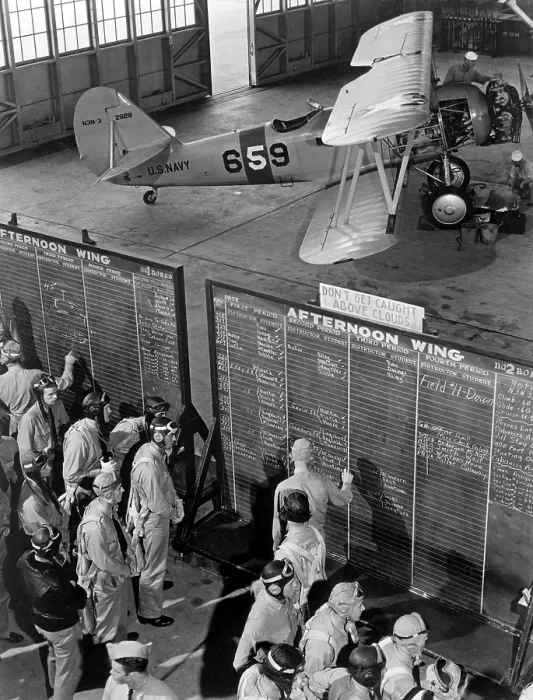 Framed Print : Aviation cadets check flight boards for last minute instructions at Corpus Christi, Texas. World War 2, Nov. 1942. (BSLOC_2013_11_191)