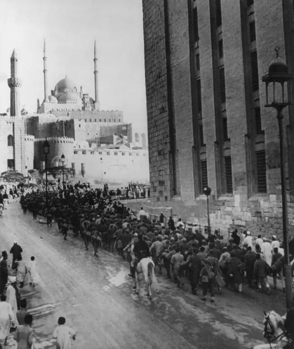Framed Print : Axis prisoners captured in Libya nearing the Citadel of Cairo. Italian and German POWs march within view of the Mohamed Ali Mosque above and the Mosque of Sultan Hassan. Ca Framed Print : Axis prisoners captured in Libya nearing the Citadel of Cairo. Italian and German POWs march within view of the Mohamed Ali Mosque above and the Mosque of Sultan Hassan. Ca